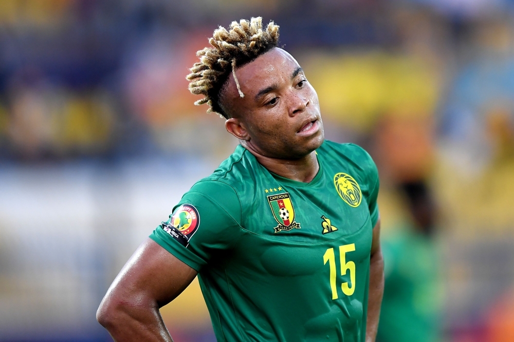 Cameroon's forward Christian Bassogog (L) fights for the ball with Benin's defender Khaled Adenon during the 2019 Africa Cup of Nations (CAN) Group F football match at the Ismailia Stadium in the north-eastern Egyptian city on Tuesday. — AFP