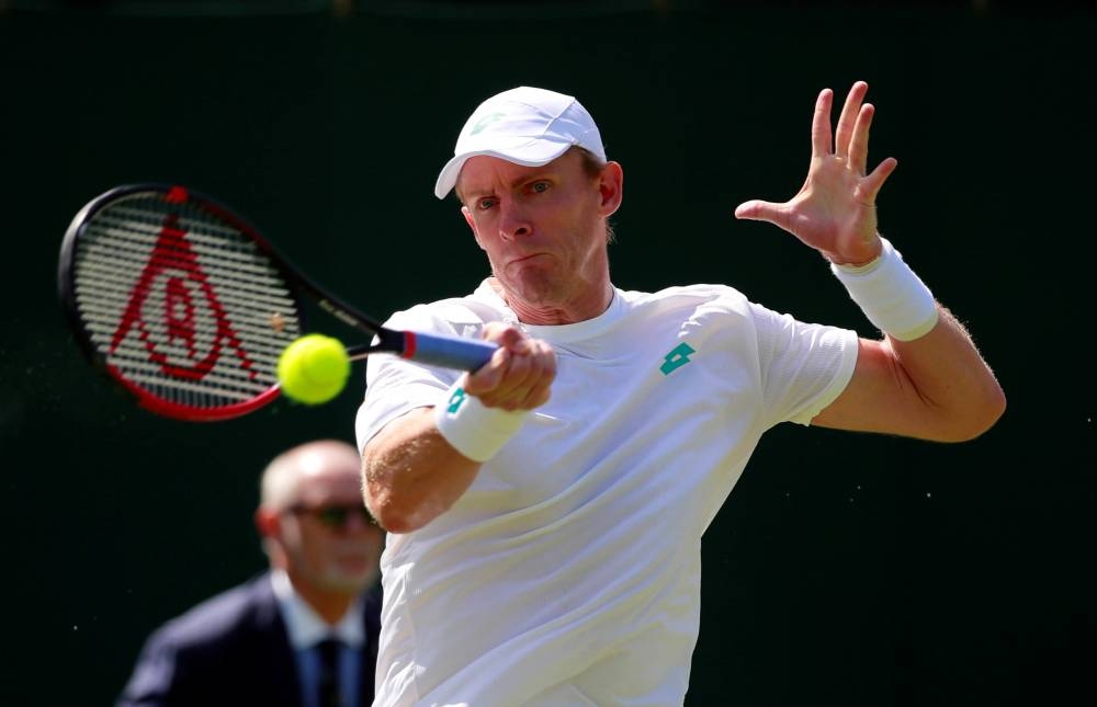 South Africa's Kevin Anderson in action during his first round match against France's Pierre-Hugues Herbert at the Wimbledon, All England Lawn Tennis and Croquet Club, London, in this file photo of July 1, 2019. — Reuters