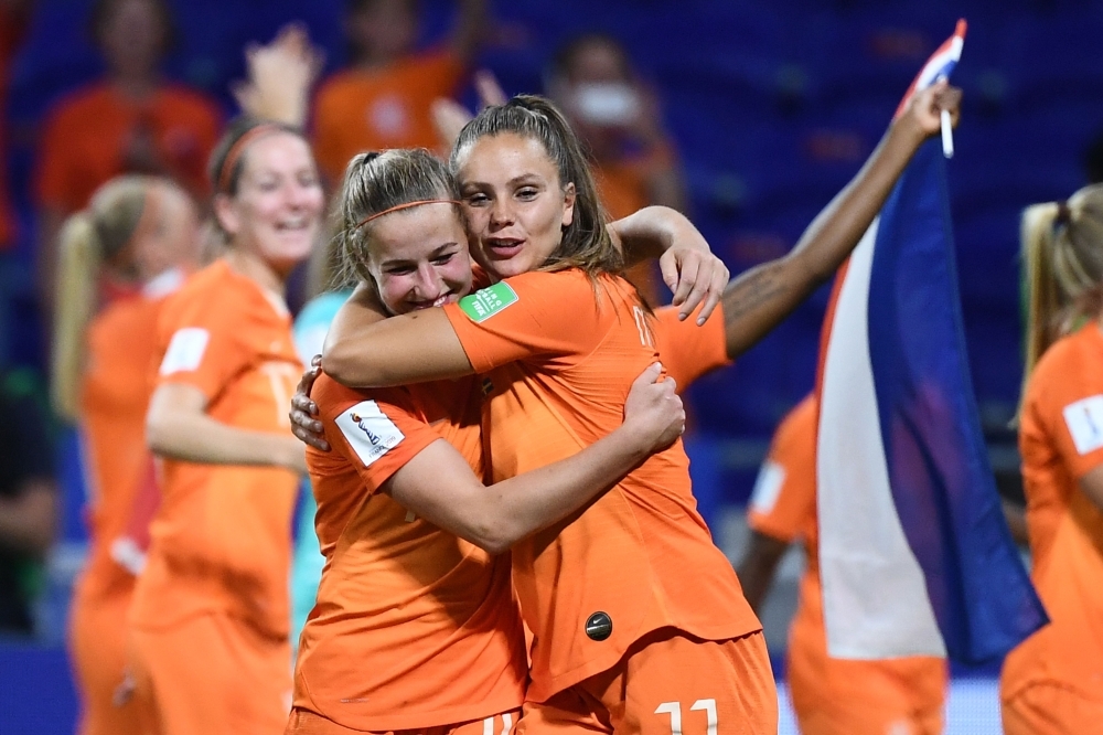 Netherlands' midfielder Jackie Groenen (C) is congratulated by teammates after scoring a goal during the France 2019 Women's World Cup semifinal football match against Sweden at the Lyon Stadium in Decines-Charpieu, central-eastern France, on Wednesday. — AFP 