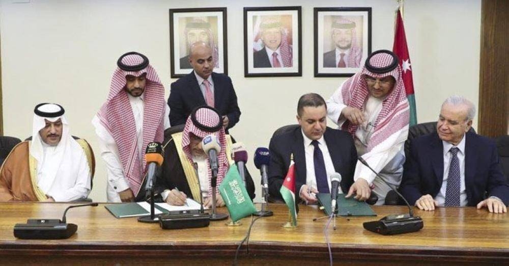 Saudi Fund for Development Chairman Dr. Khalid Bin Sulaiman Al-Khudairy signs the financing agreement with Jordanian Minister of Planning Mohammed Al-Assass in Amman on Thursday.