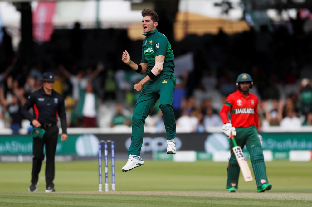 Pakistan's Shaheen Afridi celebrates taking the wicket of Bangladesh's Mustafizur Rahman to win the ICC Cricket World Cup match on Friday. — Reuters