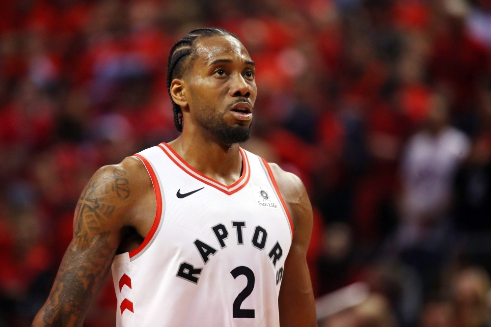 In this file photo, free agent forward Kawhi Leonard will sign with the Los Angeles Clippers, league sources say on late Friday. Leonard, a 28-year-old forward, is coming off a championship campaign in his only season with the Toronto Raptors, earning his second NBA Finals MVP in the process. — AFP