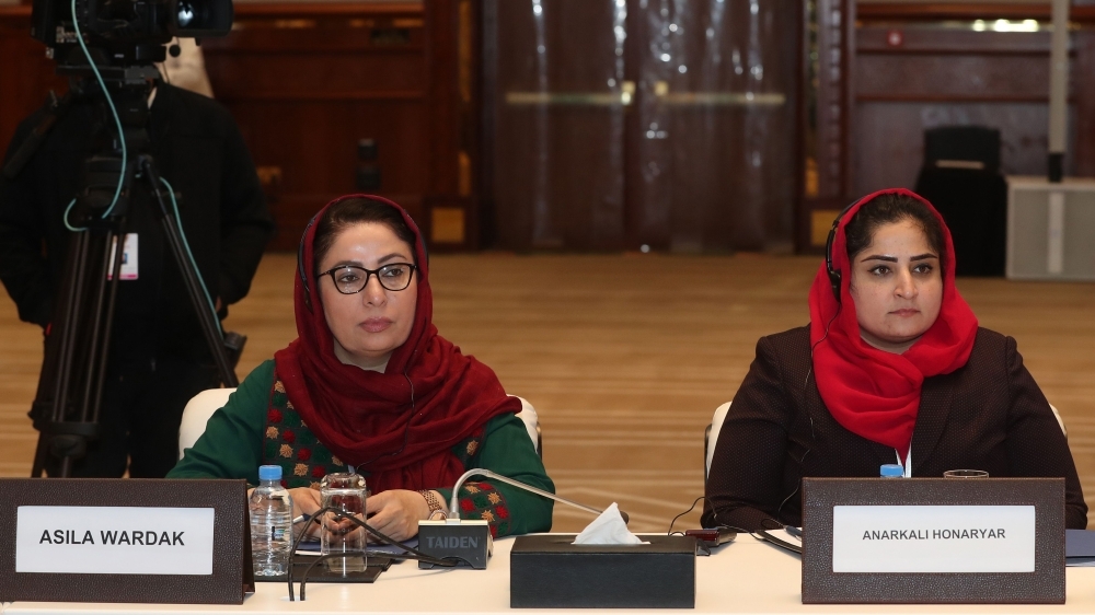 Noorullah Noori (center) and Mohammad Nabi Omari (right), members of the Taliban who were former prisoners held by the US at Guantanamo Bay and reportedly released in 2014 in a prisoner exchange, attend the Intra-Afghan Dialogue talks in the Qatari capital Doha, Sunday. — AFP