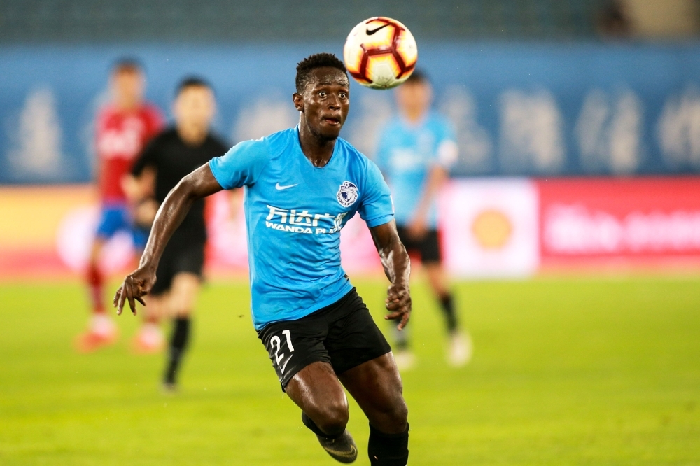 Dalian Yifang's Emmanuel Boateng controls the ball during the Chinese Super League (CSL) football match between Dalian Yifang and Henan Jianye in Dalian in northeast China's Liaoning province on Sunday. — AFP