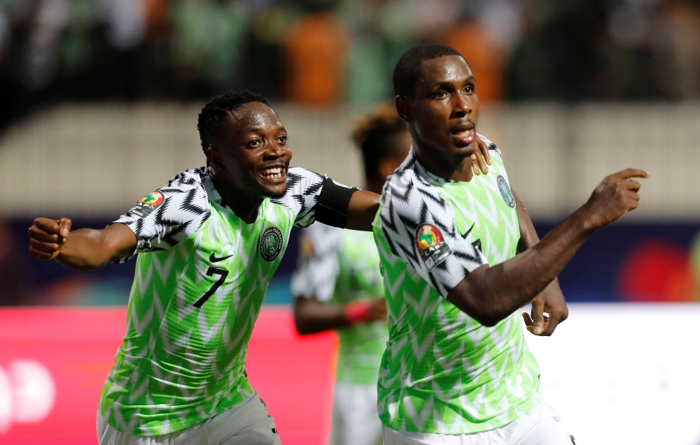 Nigeria's Odion Ighalo celebrates scoring their second goal with Ahmed Musa against Cameroon during Africa Cup of Nations 2019 match at Alexandria Stadium, Alexandria, Egypt in this July 6, 2019 file photo. — Reuters