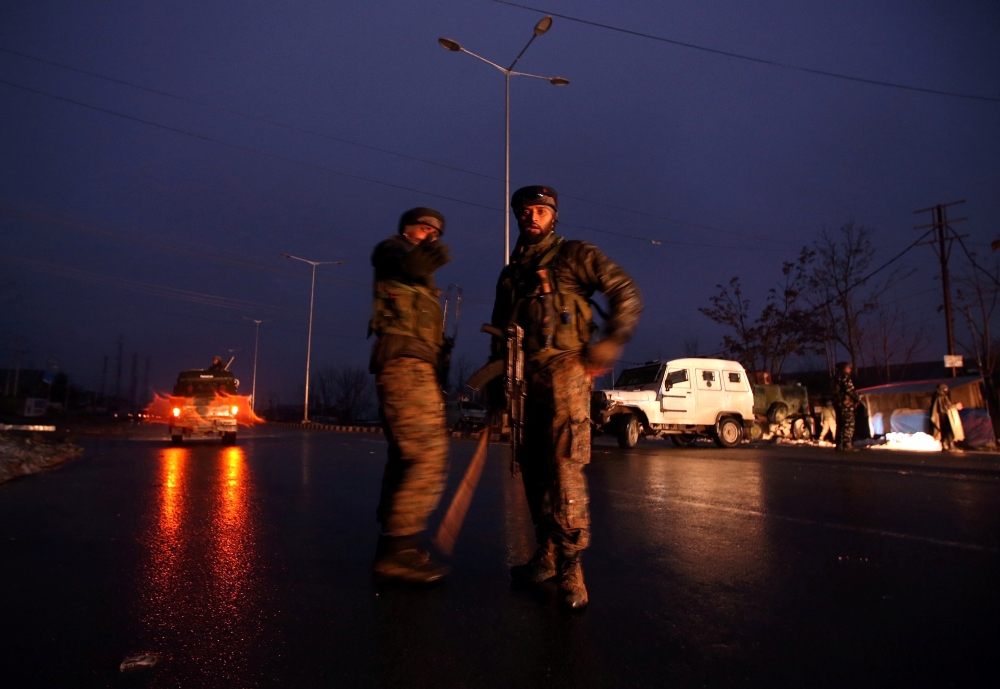 Indian soldiers stand guard near the site of explosion in Lethpora in south Kashmir's Pulwama district in this Feb. 14, 2019 file photo. — Reuters