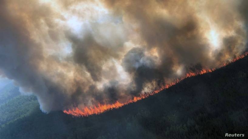  The Rainbow 2 Fire burning approximately 15 miles west of Delta Junction and west of the Tanana River near Delta Creek, Alaska, June 29. -Reuters