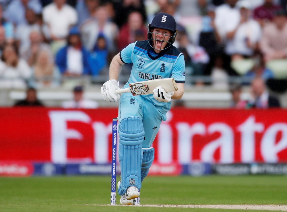 England's Eoin Morgan celebrates hitting the runs to win the  ICC Cricket World Cup semifinal match against Australia at  Edgbaston, Birmingham, Britain on Thursday. — Reuters