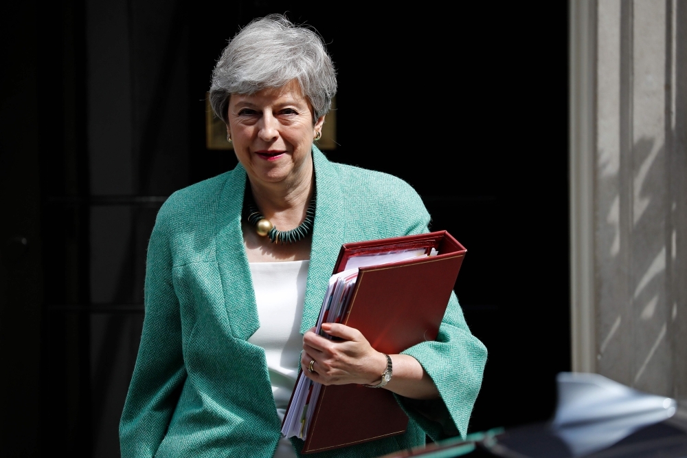 Britain's Prime Minister Theresa May leaves 10 Downing Street in London in this July 10, 2019 file photo. — AFP