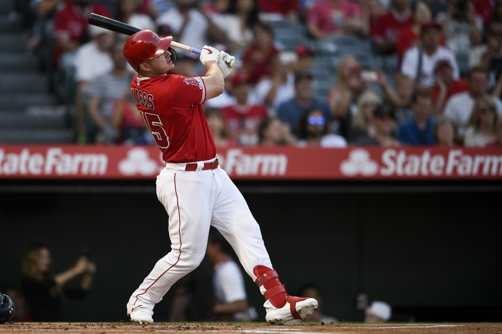 Los Angeles Angels center fielder Mike Trout (27) looks up after hitting a two-run home run during the first inning against the Seattle Mariners at Angel Stadium of Anaheim, on Friday.  — Reuters