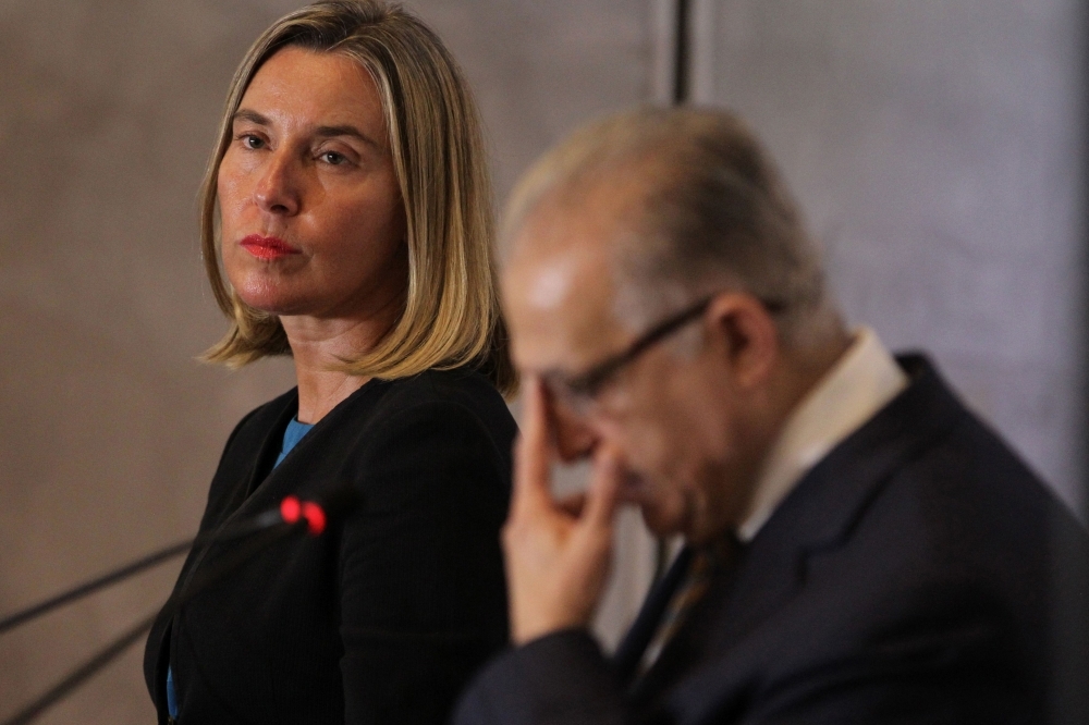 Iraqi Foreign Minister Mohamed Ali Alhakim (R) and European Union Foreign Policy Chief Federica Mogherini offer a joint press conference in the Iraqi capital Baghdad on Saturday. — AFP