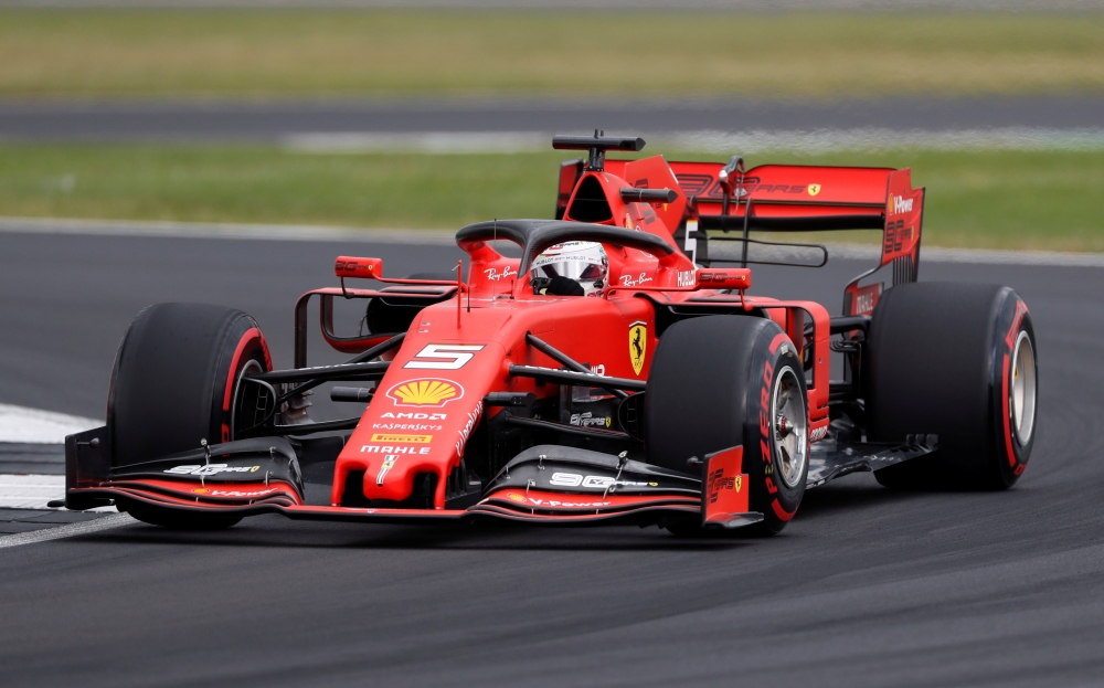 Ferrari's Sebastian Vettel during qualifying round of F1 British Grand Prix at Silverstone Circuit, Silverstone, Britain, on Saturday. — Reuters