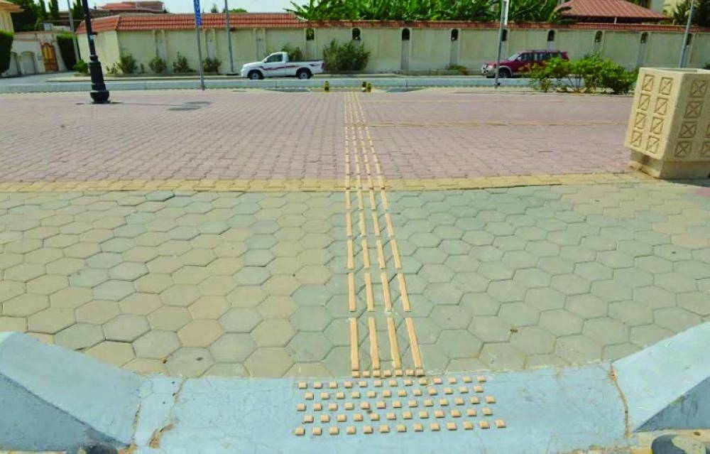 Using white sticks, the blind can easily use these tracks to reach their destinations in the holy city. — Courtesy photo