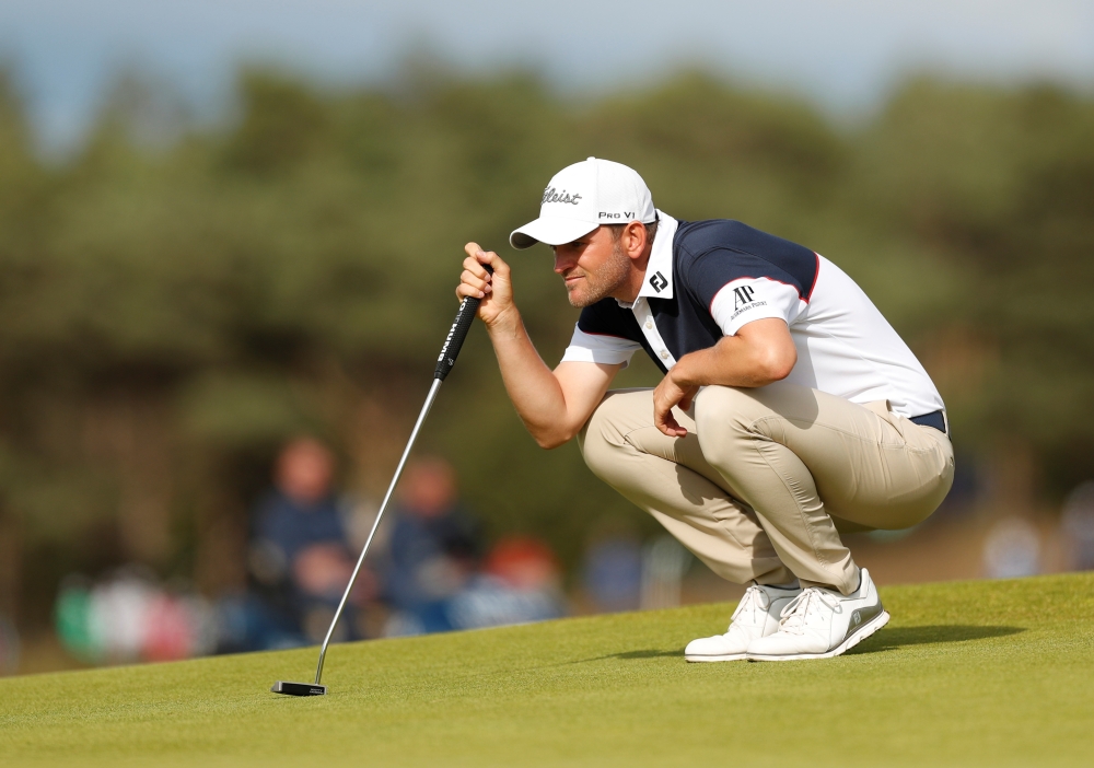 Austria's Bernd Wiesberger lines up a putt during the third round of the Scottish Open at the Renaissance Club, North Berwick, Britain, on Saturday. — Reuters