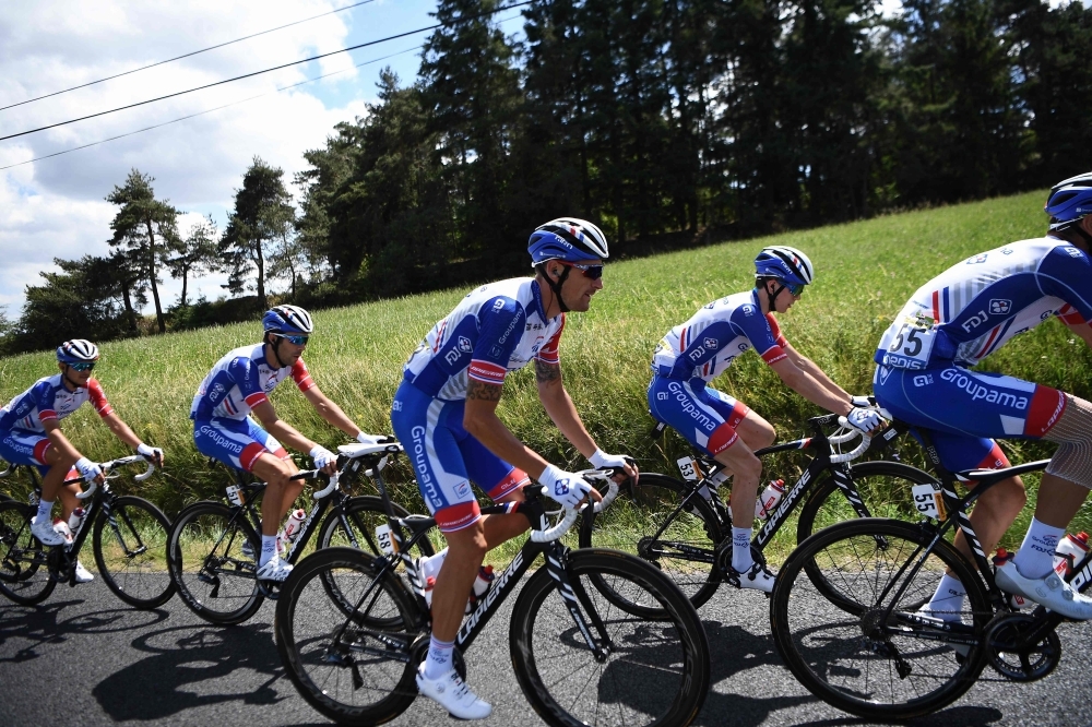 France's Thibaut Pinot (2ndL), France's Anthony Roux C(), France's David Gaudu ride with their teammates of the France's Groupama-FDJ cycling team during the ninth stage of the 106th edition of the Tour de France cycling race between Saint-Etienne and Brioude, on Saturday. — AFP