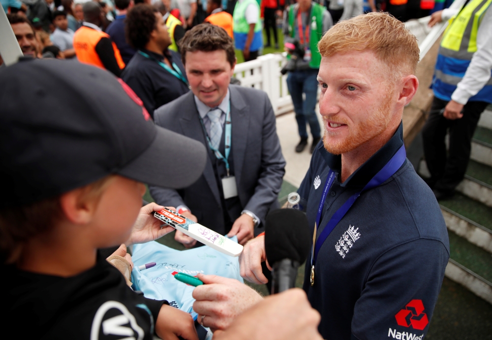 England's Ben Stokes with fans during the celebrations after England wins the Cricket World Cup at The Oval, London, on Monday. — Reuters