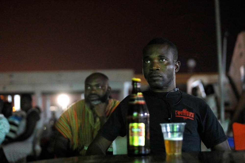 Sarah, 20, reacts while watching a Guinea counter-attack against Algeria on screen during the Africa Cup of Nations 2019 (Afcon), in Algiers, Algeria July 7, 2019. — Reuters