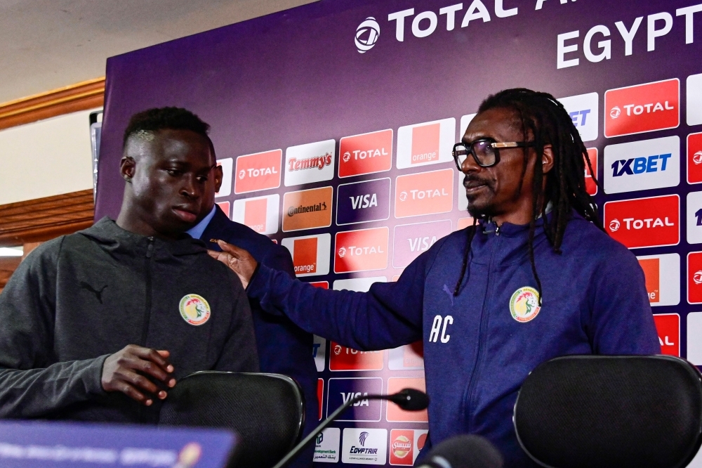Algeria's coach Djamel Belmadi (L) and Algeria's midfielder Adlene Guedioura give a press conference at the International Cairo Stadium on Thursday, on the eve of the 2019 Africa Cup of Nations (CAN) final football match between Senegal and Algeria. — AFP 