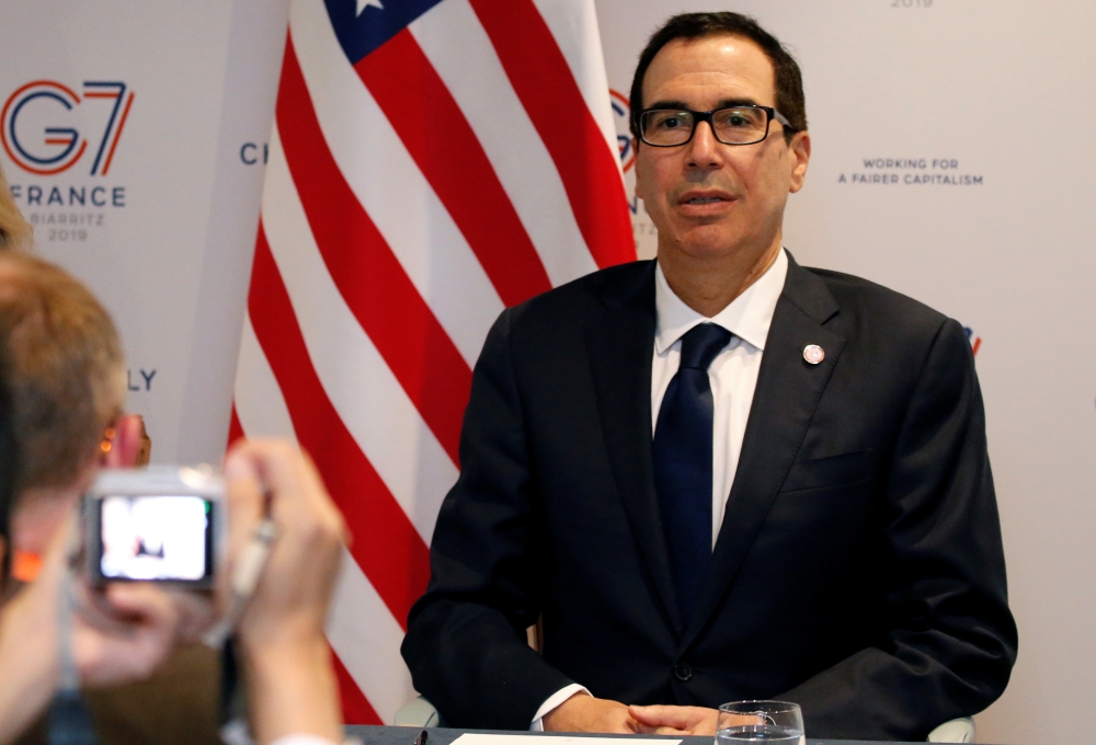 US Treasury Secretary Steven Mnuchin arrives to attend a news conference at the G7 finance ministers and central bank governors meeting in Chantilly, near Paris, France, on Thursday. — Reuters