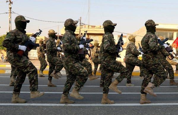 Members of a popular mobilization force taking part in a military parade last week in the town of Taza, near the northern oil city of Kirkuk, Iraq, in this file photo. — Reuters