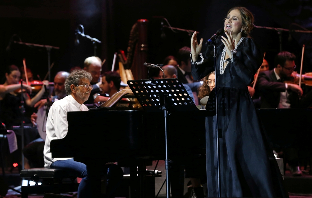 Yasmina Joumblatt, the granddaughter of the legendary singer Asmahan, and Gabriel Yared, a Lebanese composer, perform during the Beitiddine Art Festival in Beiteddine, Lebanon, on Thursday. — Reuters