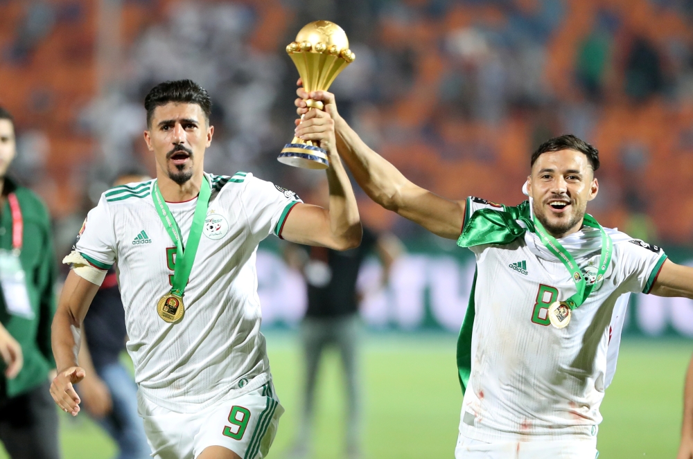 Algerian players celebrate after winning the 2019 Africa Cup of Nations final football match between Senegal and Algeria at the Cairo International Stadium in Cairo on Friday. – AFP