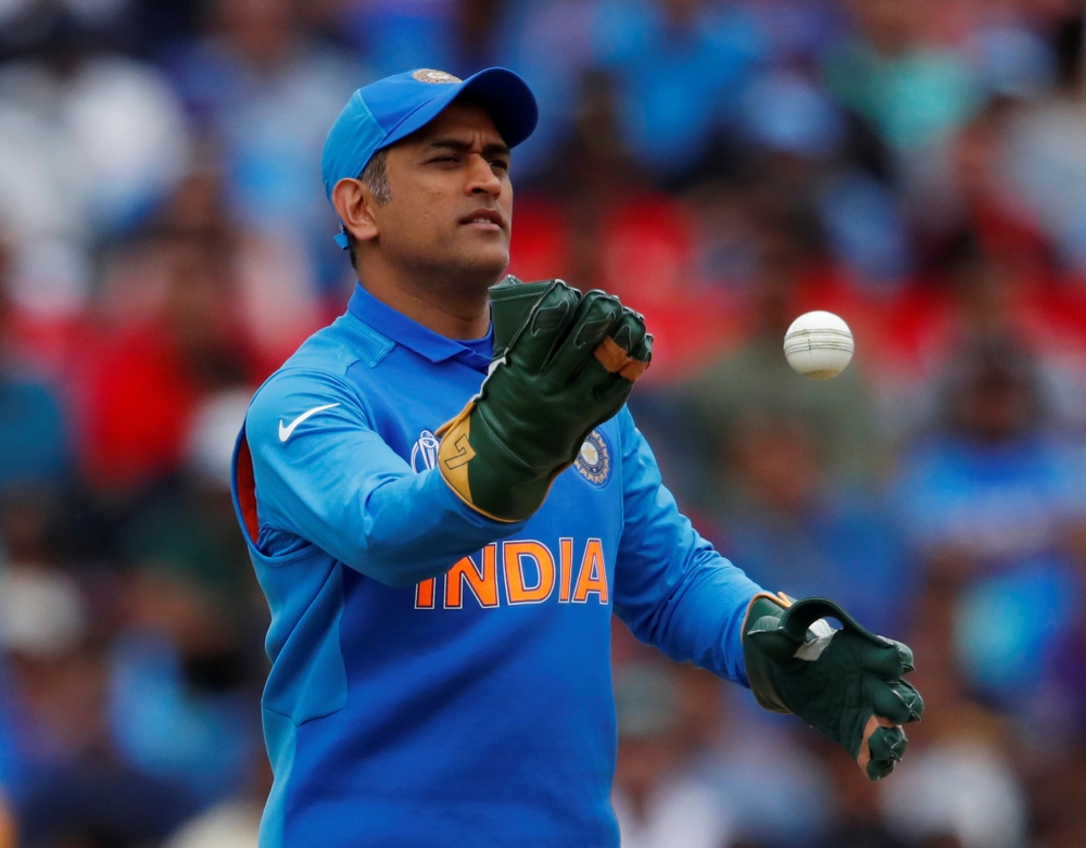 India's MS Dhoni wearing his new gloves without an emblem on them during the India vs Australia match at The Oval, London, in this June 9, 2019 file photo. — Courtesy photo