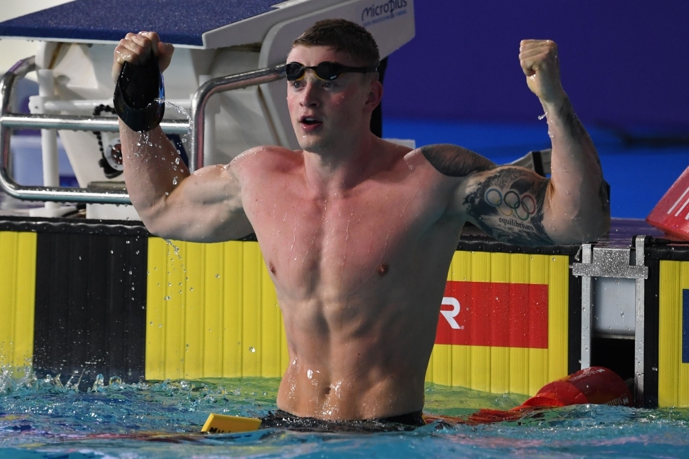 In this file photo taken on Aug. 8, 2018, Britain's Adam Peaty celebrates winning gold in the men's 50m breaststroke swimming final at the Tollcross swimming center during the 2018 European Championships in Glasgow. — AFP