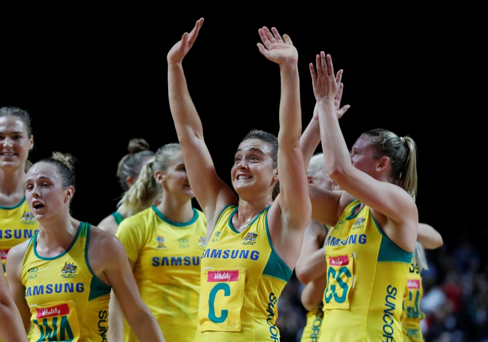 Australia's Paige Hadley, Liz Watson and team mates celebrate winning their Netball World Cup semifinal match against South Africa at M&S Bank Arena, Liverpool, Britain, Saturday. — Reuters
