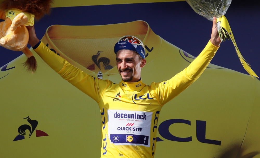 France's Thibaut Pinot celebrates as he wins on the finish line of the fourteenth stage of the 106th edition of the Tour de France cycling race between Tarbes and Tourmalet Bareges, in Tourmalet Bareges on Saturday. — AFP