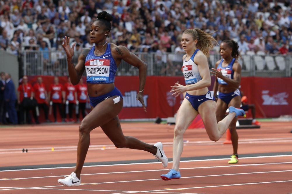 Jamaica's Elaine Thompson (L) competes in the women's 200m event during the the IAAF Diamond League Anniversary Games athletics meeting at the London Stadium in London, on Saturday. — AFP