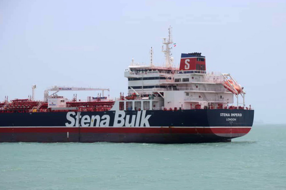 This handout picture released by Tasnim News Agency, shows British-flagged tanker Stena Impero anchored in Bandar Abbas in southern Iran. A British-flagged tanker seized by Iran is now at anchor off the port of Bandar Abbas with all its crew aboard after colliding with a fishing boat. — AFP