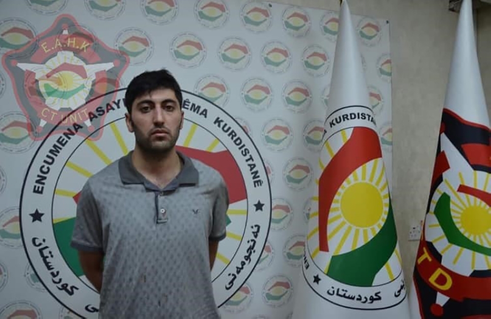 This handout photograph released by the Kurdistan Region Counterterrorism Unit on Saturday, shows 27-year-old Mazloum Dag, a Kurdish man from Turkey who was identified as the suspected shooter in the murder of a Turkish diplomat, standing at an undisclosed location in Erbil. — AFP