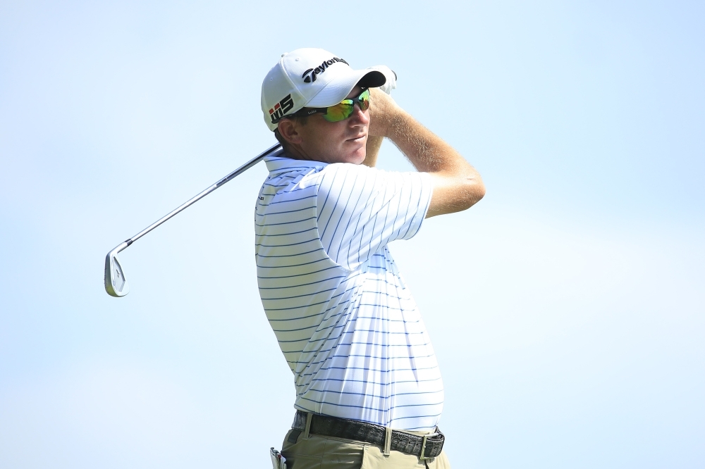 Jim Herman of the United States plays his shot from the 12th tee during the third round of the Barbasol Championship at Keene Trace Golf Club in Nicholasville, Kentucky, on Saturday. — AFP