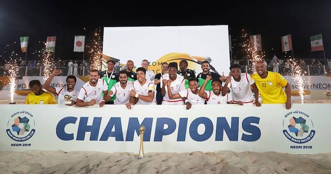 The Omani team celebrates after winning the Neom Beach Soccer Cup 2019 title on Saturday. — Courtesy photo
