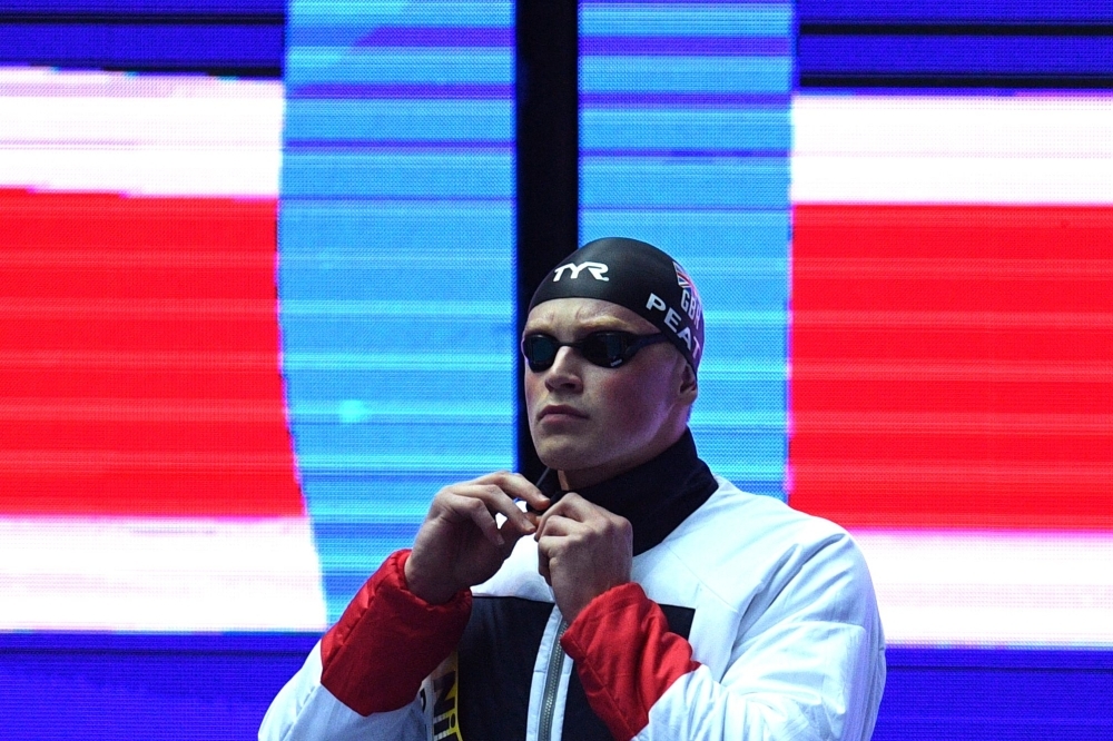 Britain's Adam Peaty competes in the semifinal of the men's 100m breaststroke event during the swimming competition at the 2019 World Championships at Nambu University Municipal Aquatics Center in Gwangju, South Korea, on Sunday. — AFP