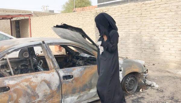 Salma Al-Sharif's car was set ablaze right in front of her home in Makkah. — Okaz photo