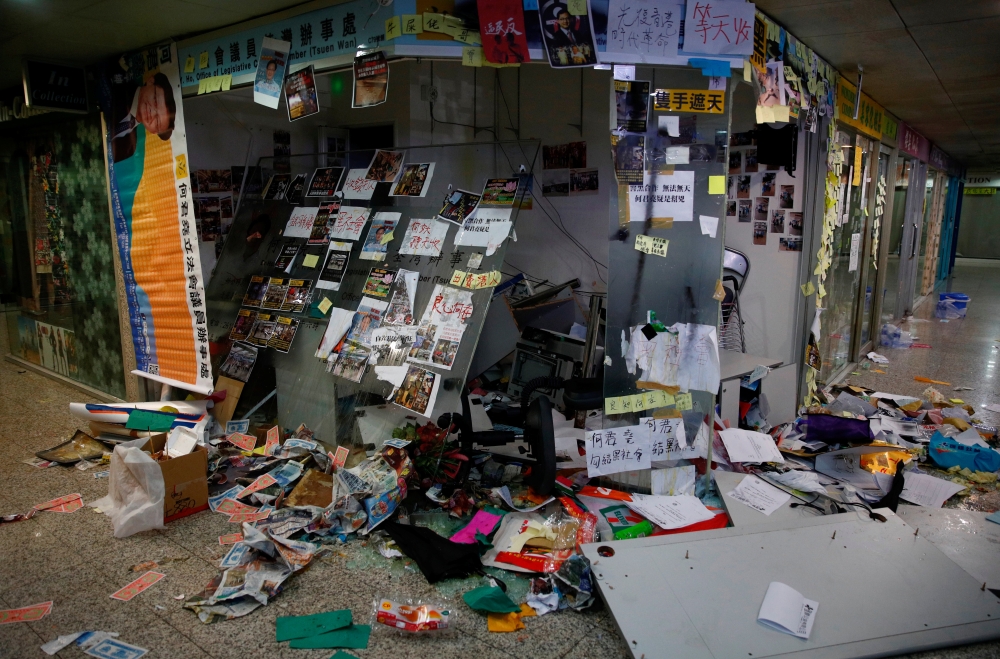 The office of pro-China lawmaker Junius Ho is seen destroyed by anti-extradition supporters in Hong Kong, China, on Monday. — Reuters