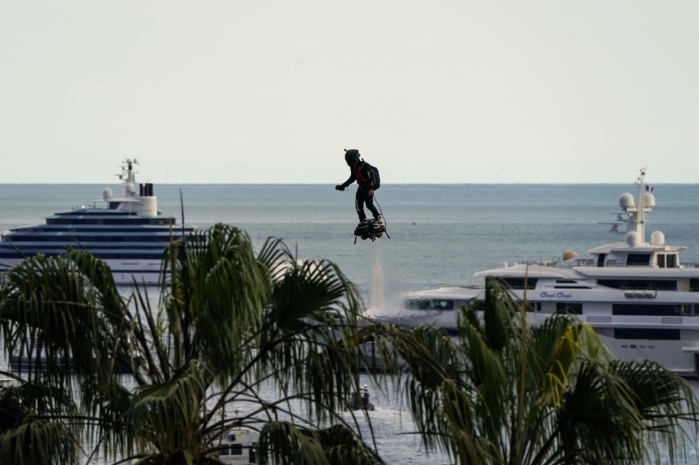 In this file photo taken on May 15, 2018, Zapata CEO Franky Zapata flies a jet-powered hoverboard or 