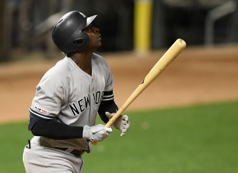 Didi Gregorius of the New York Yankees watches his two-run double against the Minnesota Twins during the eighth inning of the game at Target Field in Minneapolis, Minnesota, on Tuesday. — AFP