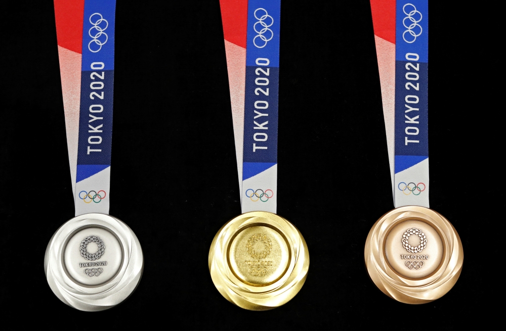 The Tokyo 2020 Olympic medals are seen displayed for the media for a photo opportunity during the 'One Year to Go' ceremony celebrating one year out from the start of the summer games at Tokyo International Forum in Tokyo, Japan, on Wednesday. — Reuters