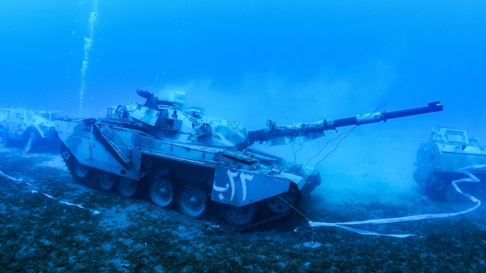 A handout picture released by Jordan's Aqaba Special Economic Zone Authority (ASEZA) on Tuesday shows a sunken Jordanian Armed Forces' Khalid battle tank on the seabed of the Red Sea off the coast of the southern port city of Aqaba, submerged to be part of a new underwater military museum.  — AFP