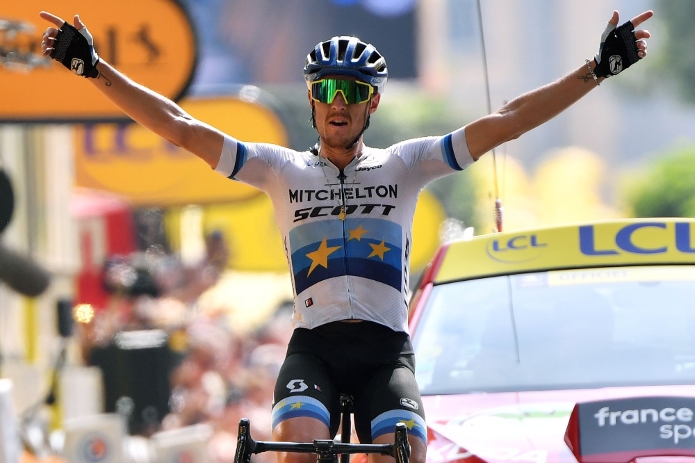 Italy's Matteo Trentin celebrates as he wins on the finish line of the 17th stage of the 106th edition of the Tour de France cycling race between Pont du Gard and Gap, in Gap, on Wednesday. — AFP