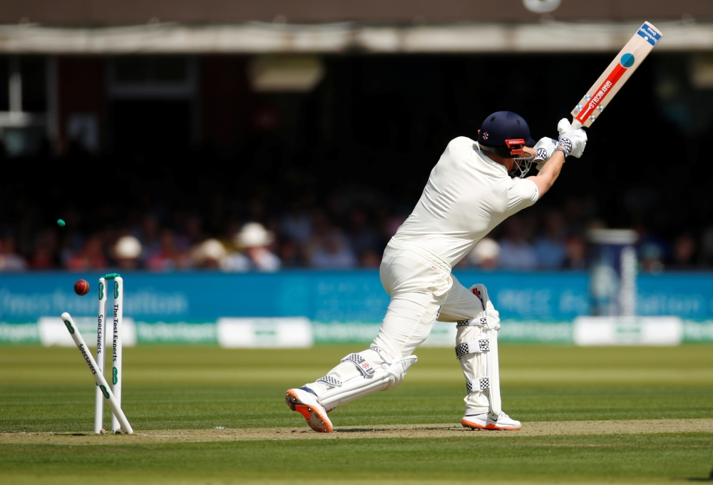 England's Jonny Bairstow is bowled out by Ireland's Tim Murtagh on the first day of the one-off Test at Lord's, on Wednesday. — Reuters