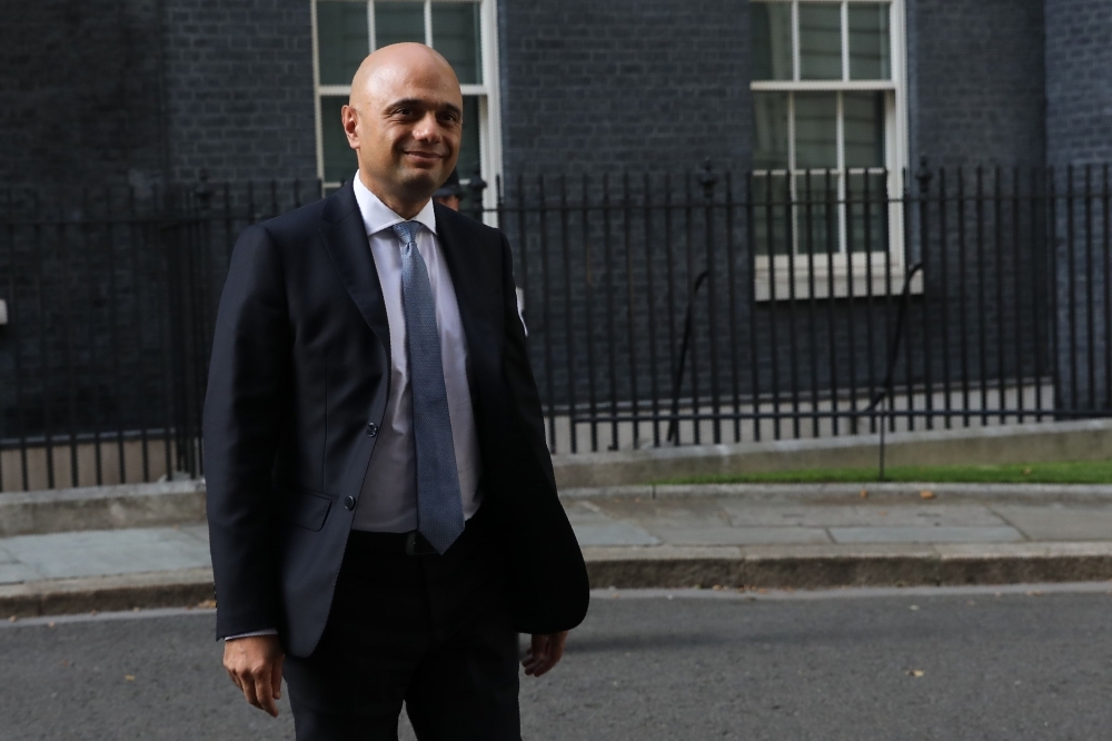 Britain's new Chancellor of the Exchequer Sajid Javid leaves 10 Downing Street in London on Wednesday. — AFP