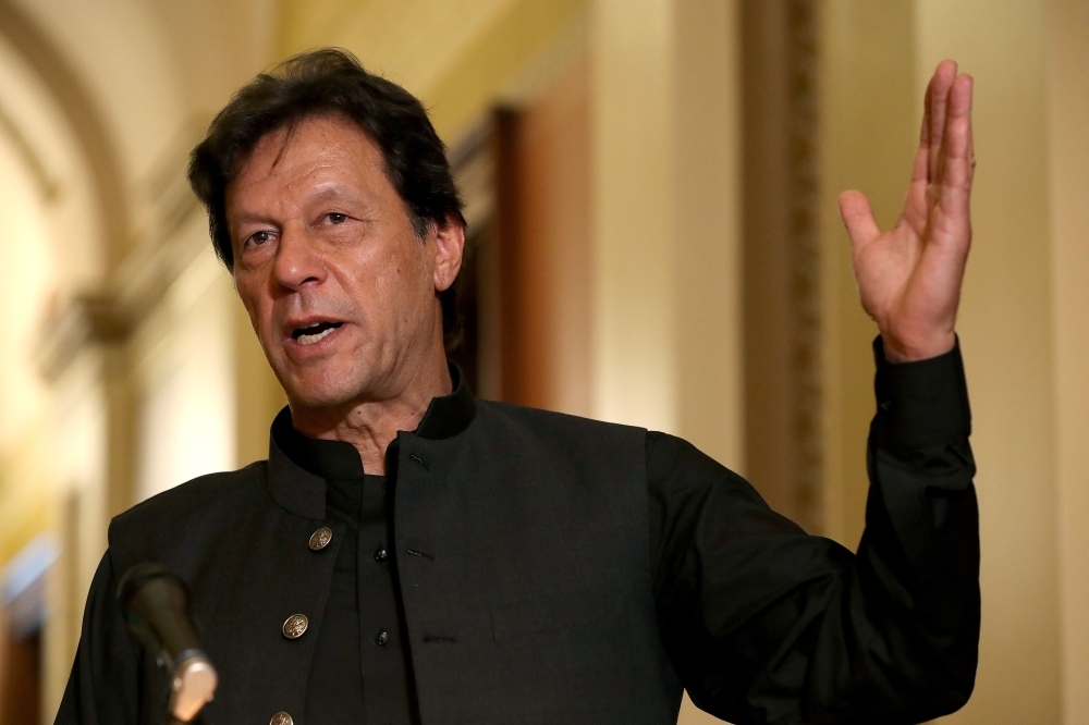 Pakistan Prime Minister Imran Khan makes a brief statement to reporters before a meeting with US House Speaker Nancy Pelosi, unseen, at the US Capitol in Washington in this July 23, 2019 file photo. — AFP