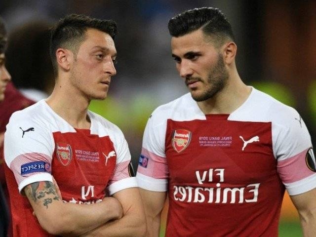 File photo of Arsenal's Ozil and Kolasinac.