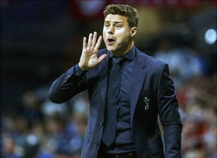 Tottenham manager Mauricio Pochettino apologized to Manchester United for his team's robust tackling in a 2-1 pre-season defeat on Thursday.