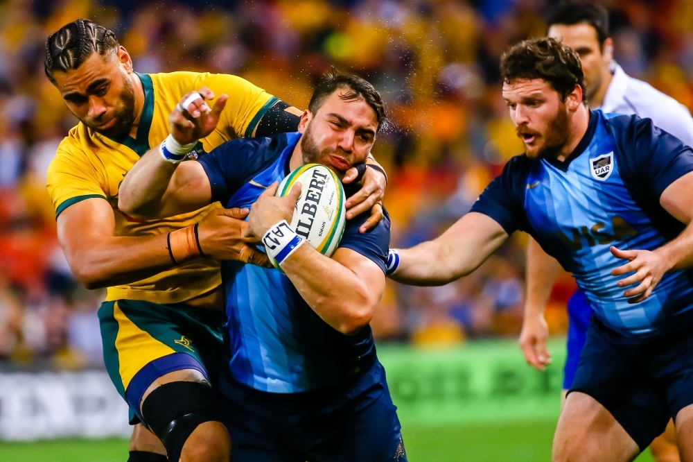 Australia's Lukhan Salakai-Loto (L) tackles Argentina's Facundo Isa (R) the Rugby Championship match between Australia and Argentina at Suncorp Stadium in Brisbane, on Saturday. — AFP