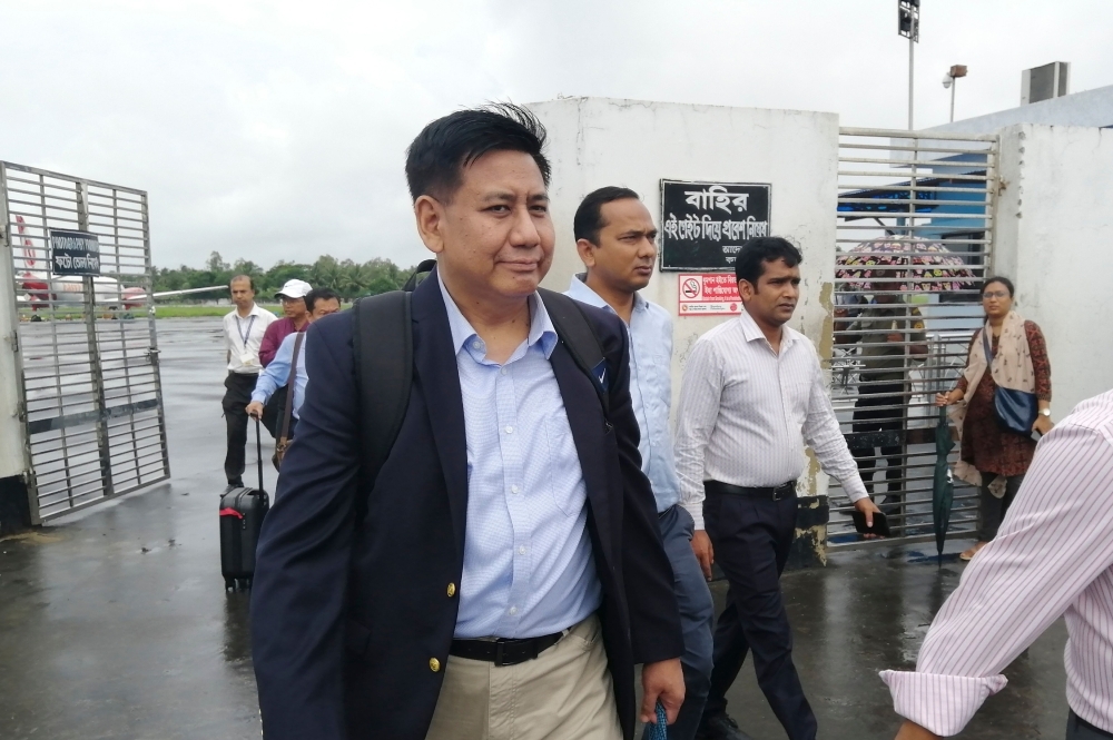 Members of the Myanmar delegation team arrive at the airport in Cox's Bazar in southern Bangladesh on Saturday, ahead of expected meetings with Rohingya leaders to inform them of measures they have taken for their return to Rakhine. Security at Rohingya refugee camps in Bangladesh was tightened for the visit of a high-level Myanmar delegation this weekend for repatriation talks, officials said. — AFP